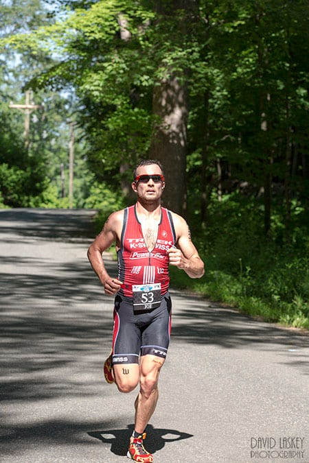 Joe Gamble, Richie Cunningham and Annabel Luxford podium at $100,000 Rev3 Quassy Half