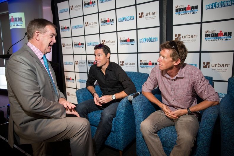 Hugh Delahunty MP has a quiet word with IRONMAN Crowwie and Luke. Ironman Melbourne Triathlon Press Launch 2013 - Photo By Lucas Wroe
