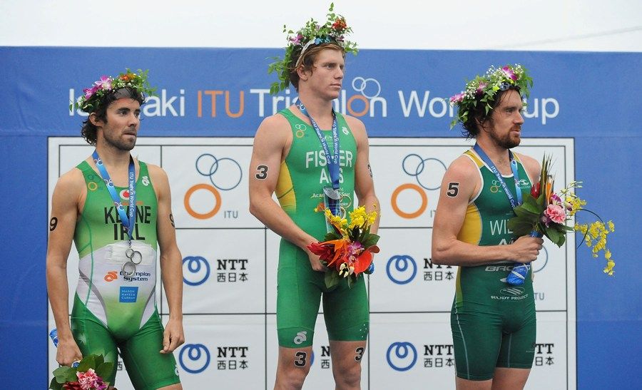 Ryan on top of the podiujm at Ishigaki - Credit: Jun Sato/ITU