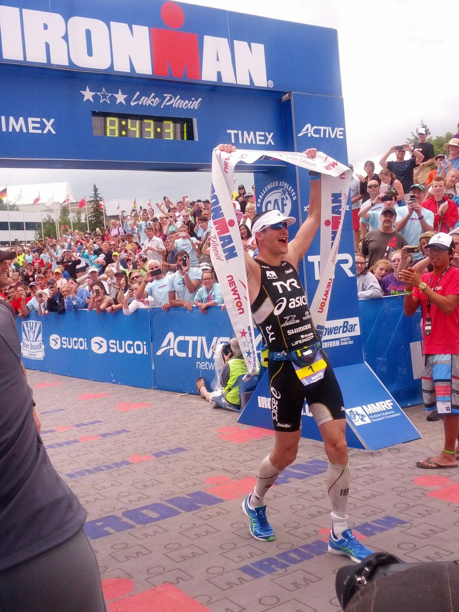 Andy Potts celebrates his second win at Ironman Lake Placid. Photo: Marie-Pier Ricard