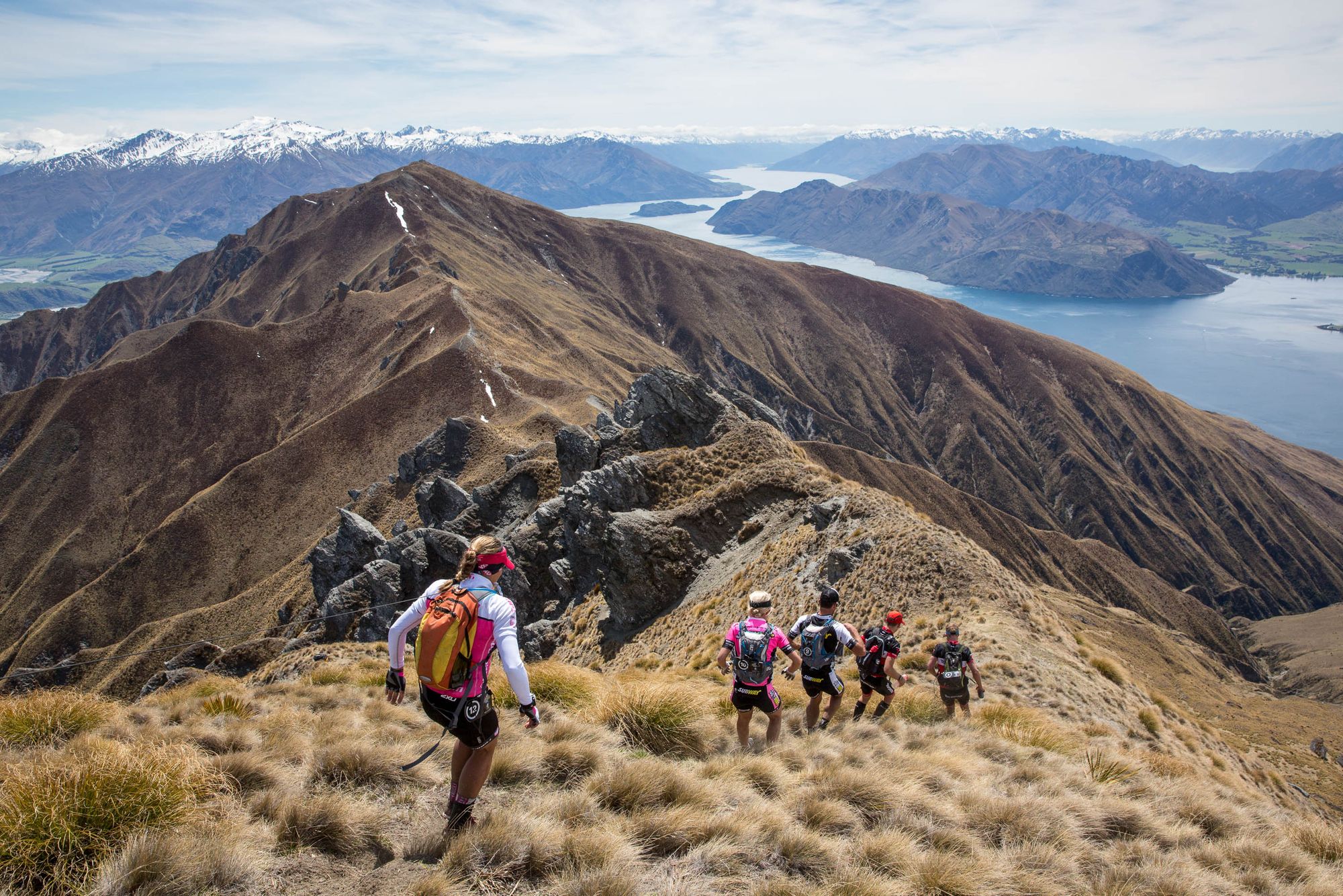 Competitors perform during the run stage during the Red Bull Defiance in Wanaka
